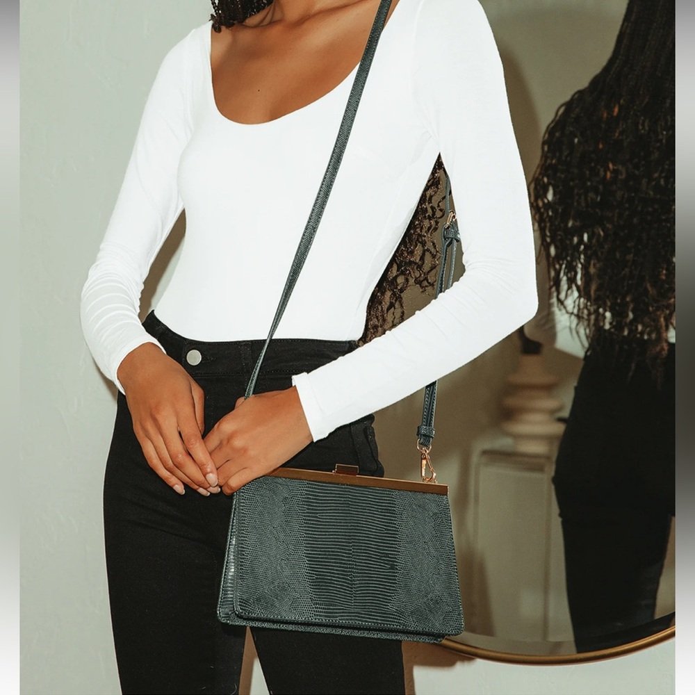 Lulus green embossed with gold accent purse